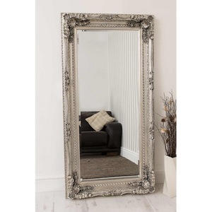 Carved silver wall mirror