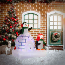 Load image into Gallery viewer, 5 ft Christmas Inflatable Penguins Wearing A Scarf With Ice House In &amp; Outdoors
