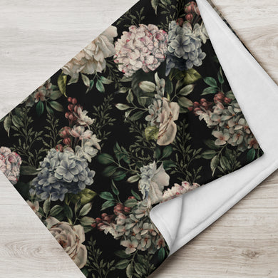 black floral blanket folded