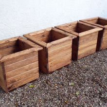 Load image into Gallery viewer, Four wooden planters set
